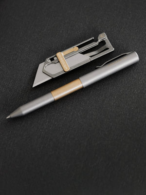 Everyday carry compact Sideslip utility knife and Contrail pocket pen in titanium and bronze