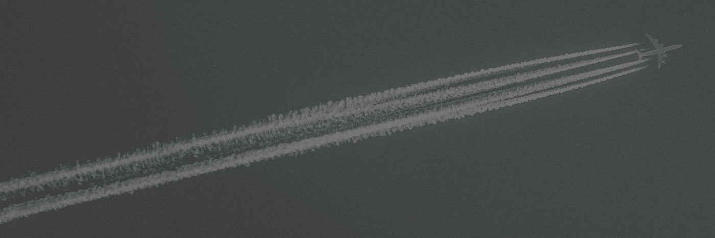 jet airplane flying with contrail