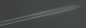 jet airplane flying with contrail