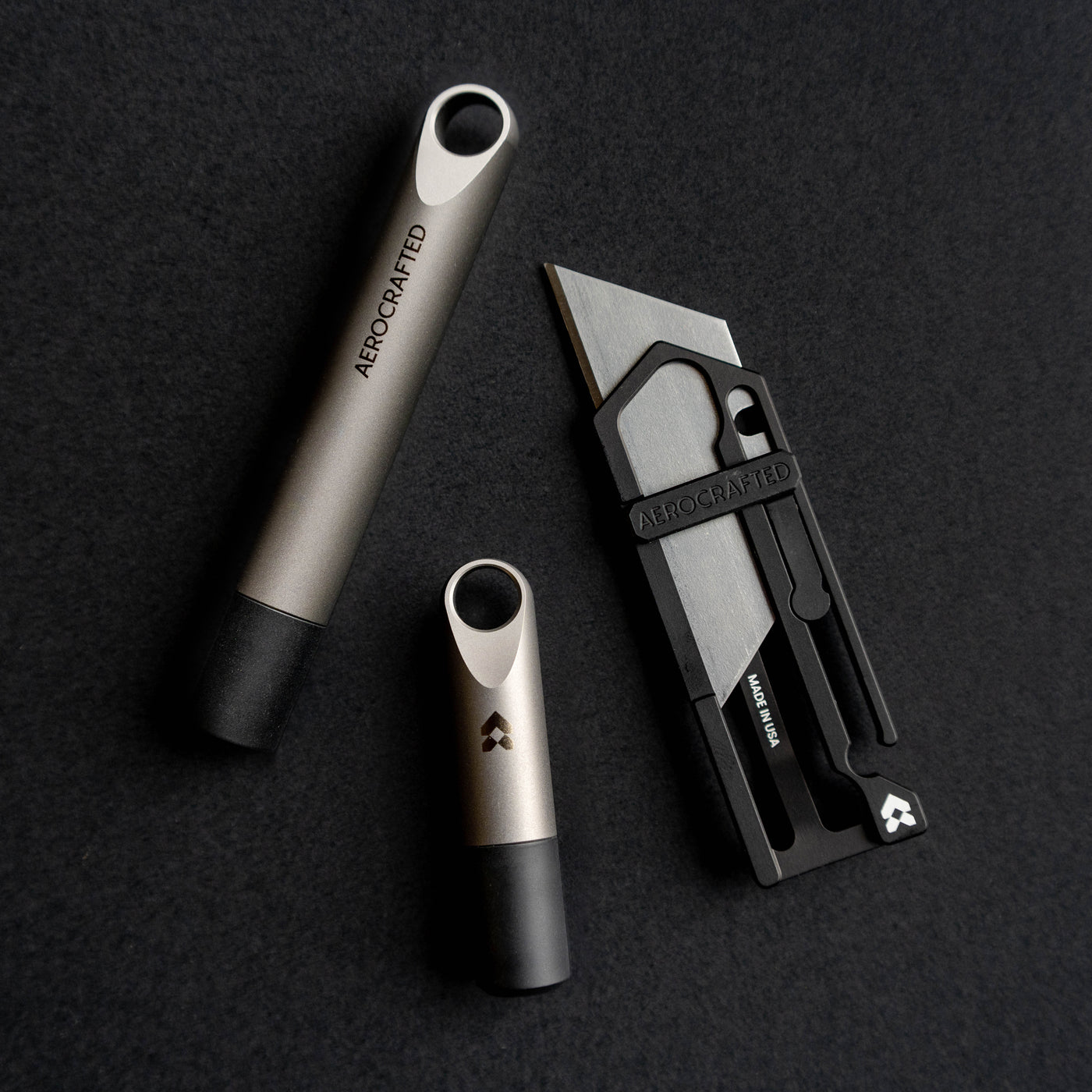 titanium minimalist keychain designed by aerospace engineers called the fairing keychain stash that can be used as a cash stash for your keychain or to put in pills #material_titanium-ultem
