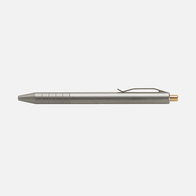 Retract click pen is a titanium pen with a bronze clicker and integral pocket clip machined by aerospace engineers in California and ships world wide #material_titanium-bronze