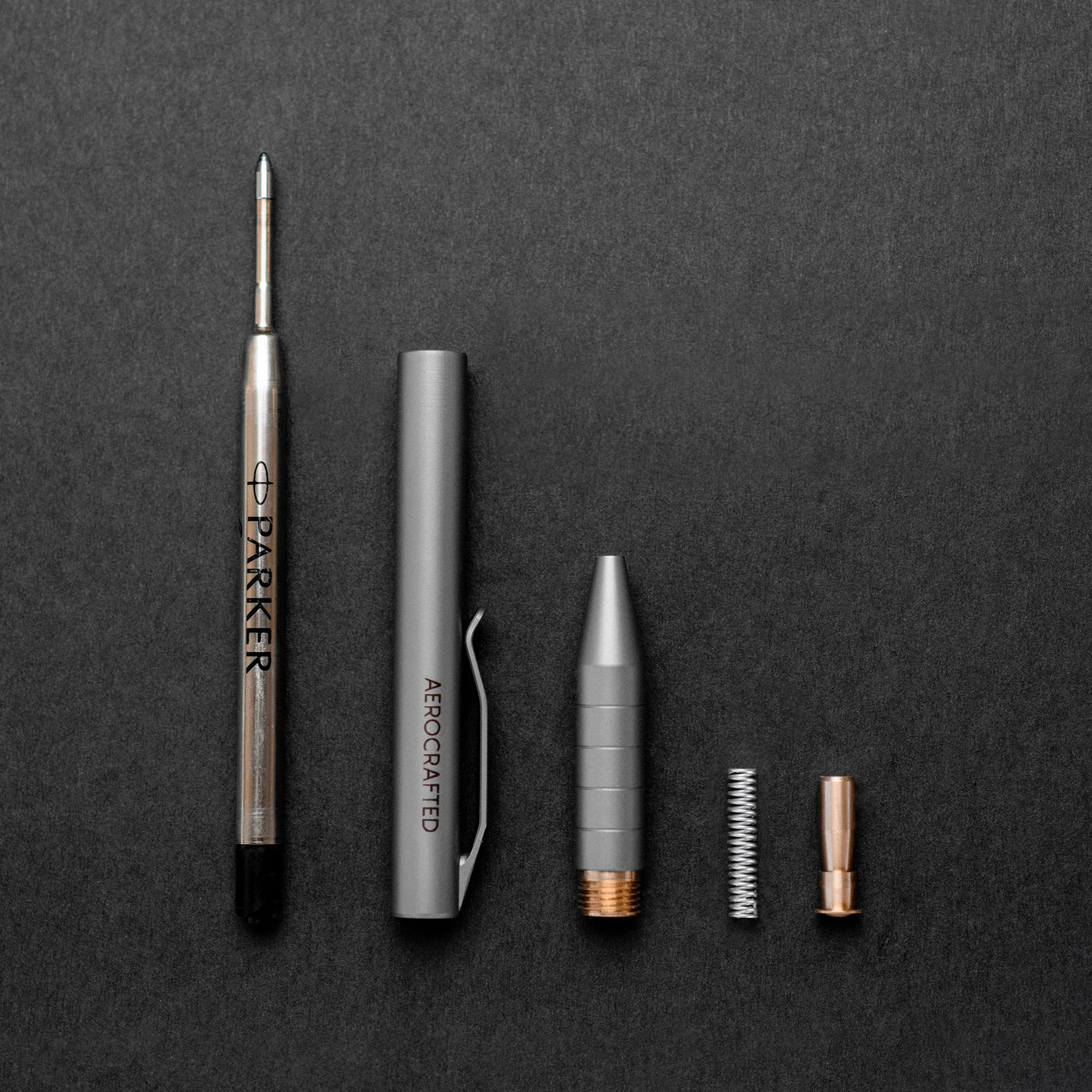 Titanium click pen is simple and easy to assemble designed with one moving bronze part and holds a parker refill ink cartridge is one of the smallest titanium pens on the market #material_titanium-bronze