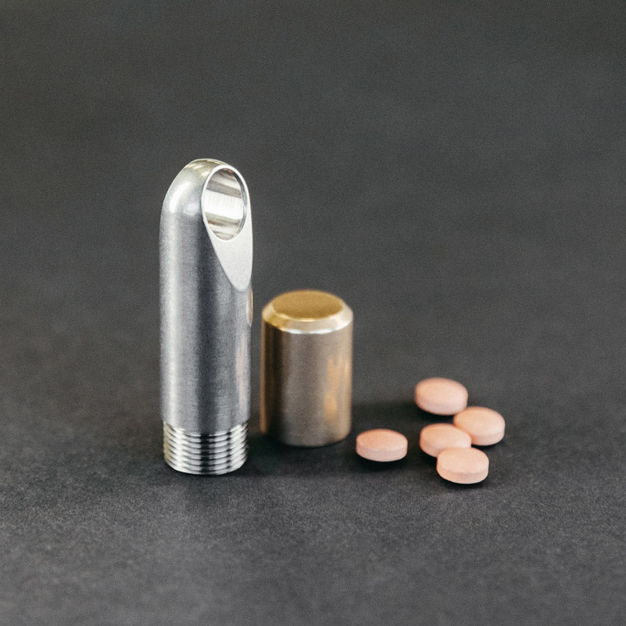 titanium edc stash to carry pills and medication but looks as a minimalist keychain machined in the usa  #material_titanium-bronze