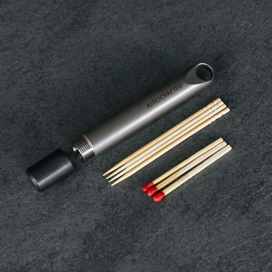 edc stash holds toothpicks and matches on keyring #material_titanium-polymer