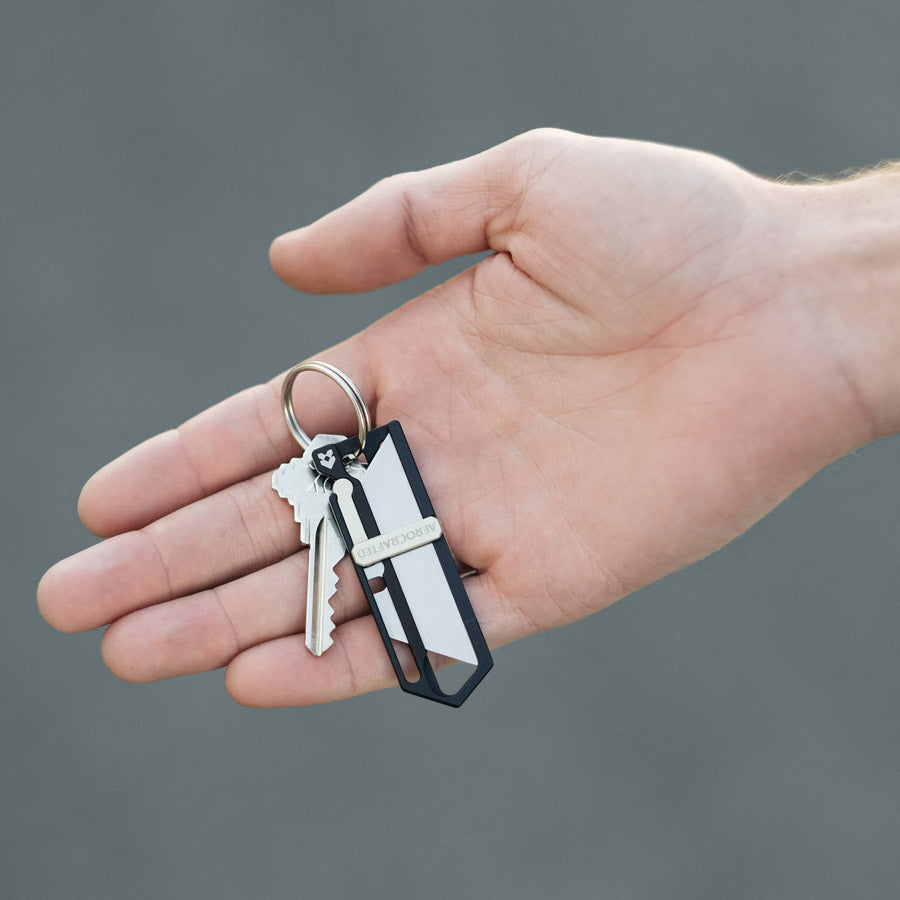 EDC pocket knife that is a small keychain knife #material_black-silver-aluminum