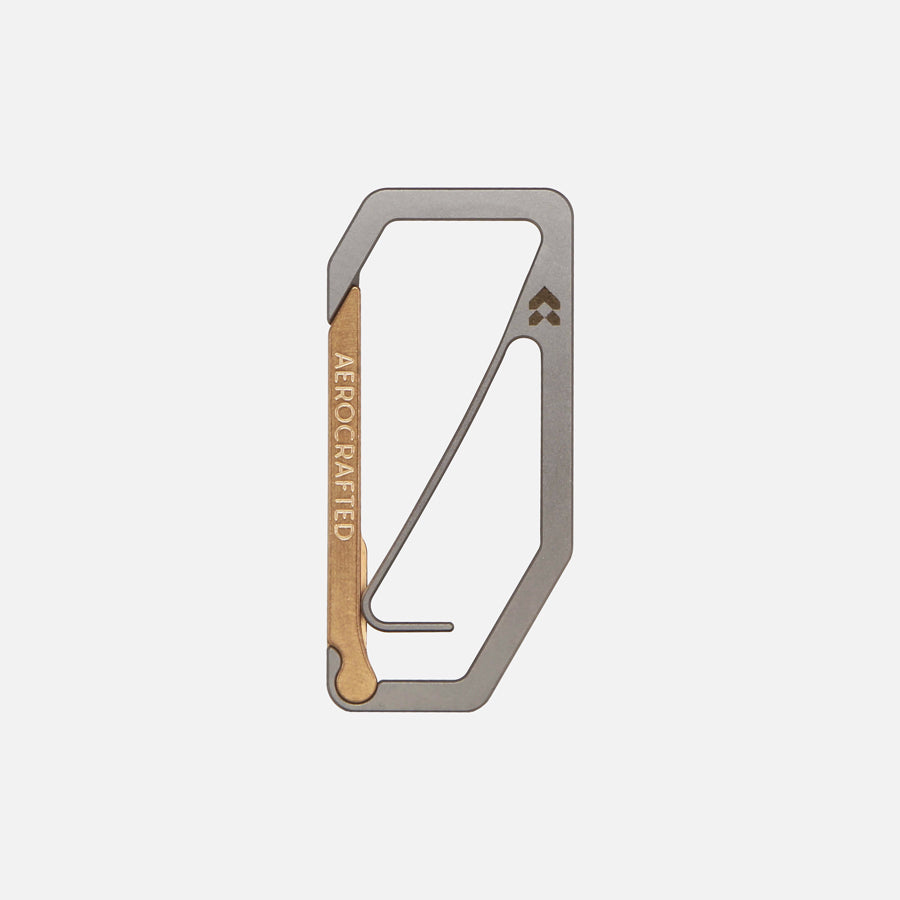 An edc carabiner designed by Aerocrafted is called the Uplock Key Carabiner and is the perfect keychain carabiner as it seperates your keys from the opening all made in the usa #material_titanium-bronze