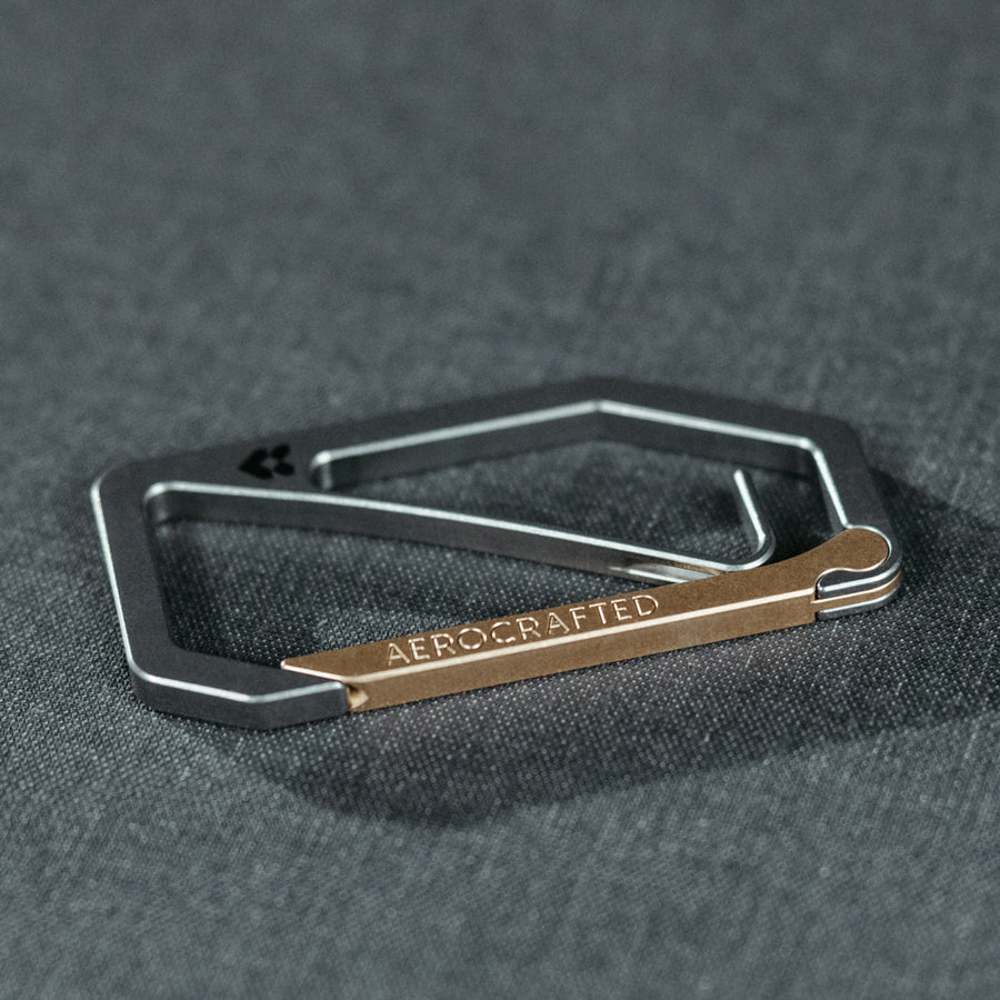 edc carabiner known as the Uplock titanium key carabiner made by Aerocrafted and made for everyday carry and american made #material_titanium-bronze