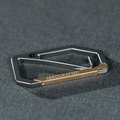 edc carabiner known as the Uplock titanium key carabiner made by Aerocrafted and made for everyday carry and american made #material_titanium-bronze