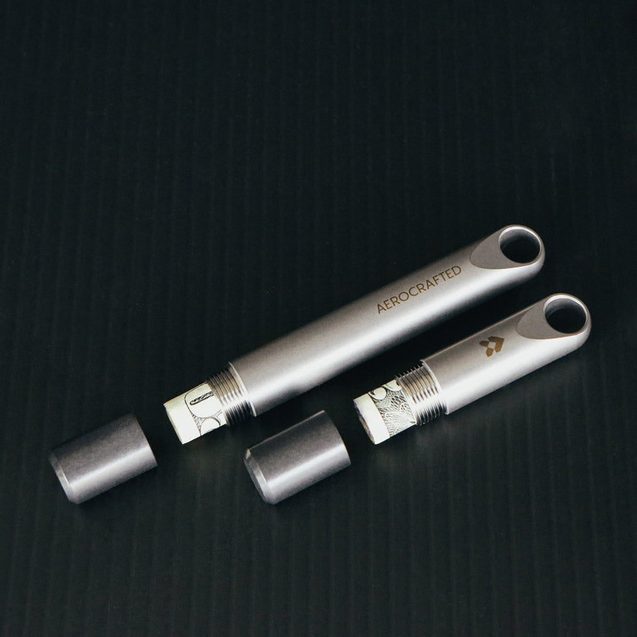 edc cash stash holds folded dollar bills and can be a minimalist keychain for your edc gear called the fairing keychain stash made by Aerocrafted in california #material_titanium-ultem
